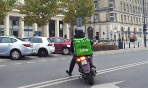 1208px Uber Eats motorbiker in Warsaw