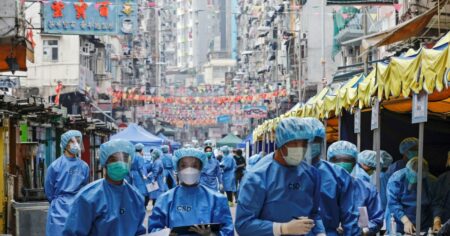 2021 01 23T053608Z 70832639 RC2FDL93D9QC RTRMADP 3 HEALTH CORONAVIRUS HONGKONG 1